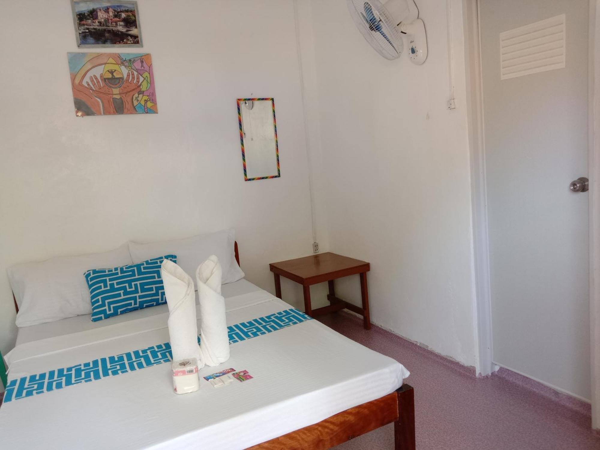 Bucana Beachfront Guesthouse El Nido Quarto foto